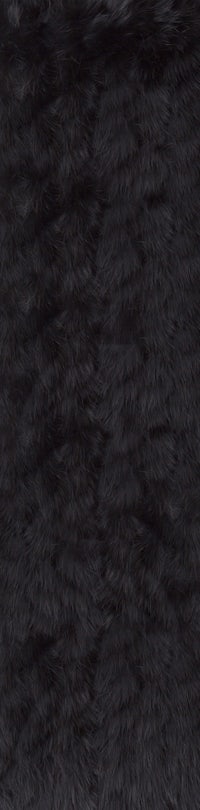 a close up image of a black fur rug